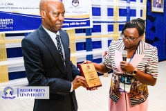 PROF.-ANTHONY-AKINLO-THE-VICE-CHANCELLOR-RECEIVING-AN-AWARD-THE-CONFERENCE-OF-THE-ASSOCIATION-OF-PHONETICIANS-AND-PHONOLOGISTS-IN-NIGERIA