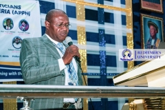 THE-UNIVERSITY-CHAPLAIN-PRAYING-AT-THE-CONFERENCE-OF-THE-ASSOCIATION-OF-PHONETICIANS-AND-PHONOLOGISTS-IN-NIGERIA-2022